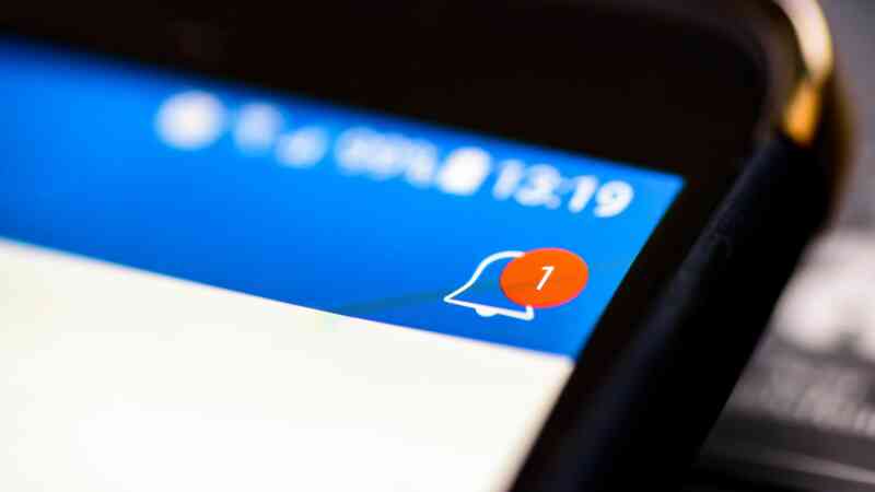 Notification icon on a phone screen, displaying a red circle with the number one, indicating a new alert.