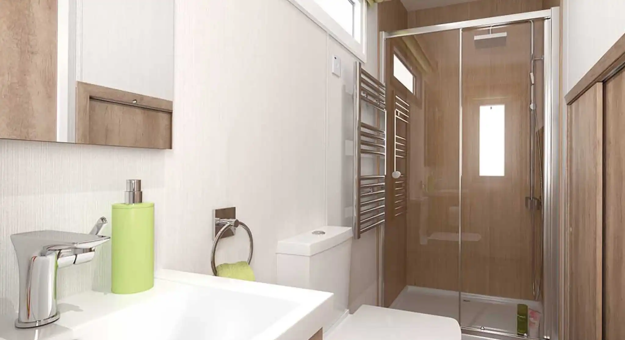 A modern bathroom featuring a glass shower, a sleek sink with a chrome faucet, and a toilet. The walls are a light wood finish, complemented by a towel warmer. Natural light streams in through a small window.