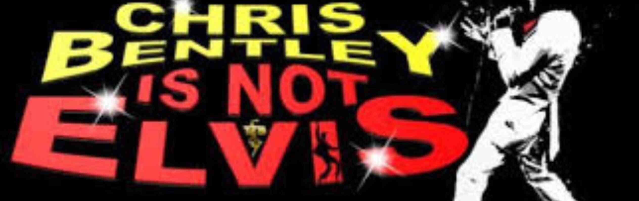 A stylized graphic featuring the text "Chris Bentley is not Elvis" in bold, colorful letters. An illustration of a performer in a white suit is shown, suggesting a musical theme. The background is predominantly black, enhancing the vibrant colors.