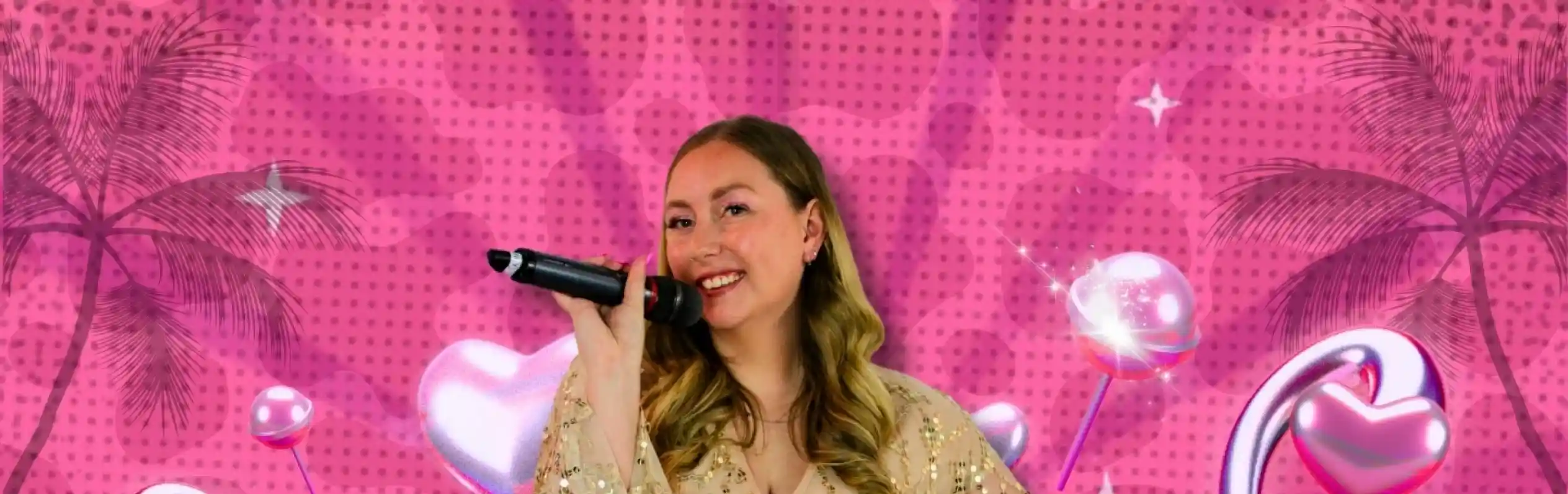 A woman with long, wavy hair holds a microphone and smiles, wearing a sparkling, light-colored outfit. The background features a bright pink pattern with hearts and palm trees. The name "Emily Pitcher" is prominently displayed in bold, white letters.