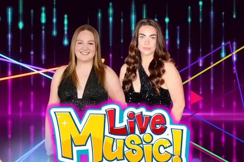 Jessie and Grace pose cheerfully in sparkly outfits against a vibrant, colorful background. Bold text states "Live Music!" above their names.