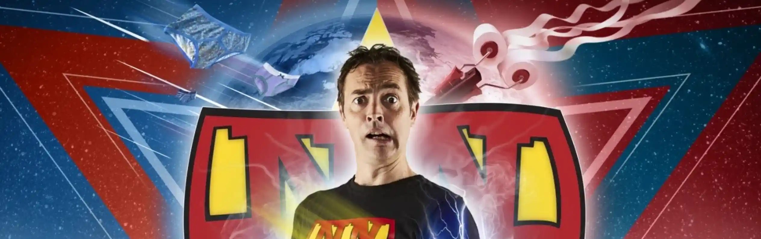 A man stands confidently in a superhero-style outfit with a colorful logo on his chest, surrounded by vibrant star patterns. He has a surprised expression and electric energy swirls around him, adding a dynamic effect. The background features bold colors of blue and red.