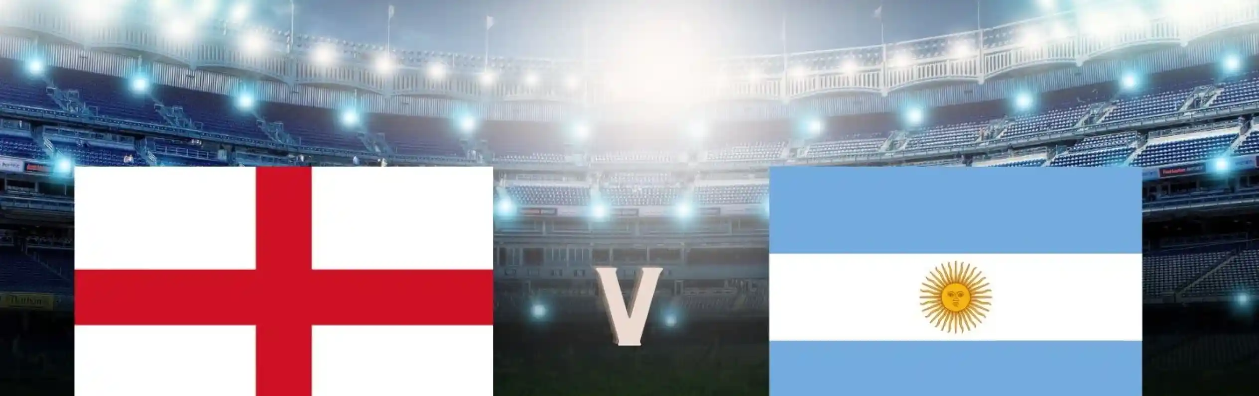 English and Argentinian flags displayed with "England v Argentina" text on a grassy soccer field under stadium lights.