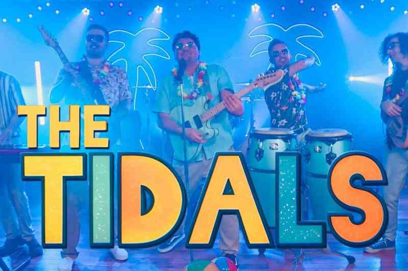 A lively band named "The Tidals" performs on stage, wearing tropical shirts and leis. They are playing various instruments, including a guitar and congas, with a vibrant blue background featuring palm trees and colorful lights.