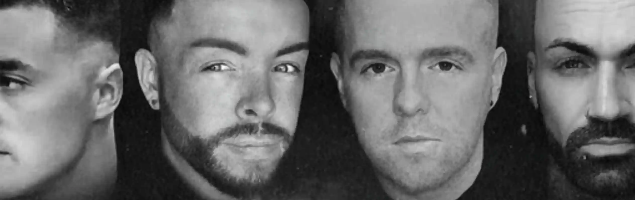 Four male figures with varying hairstyles and facial expressions are set against a dark, smoky background. The imagery has a dramatic and artistic style, emphasizing their features.