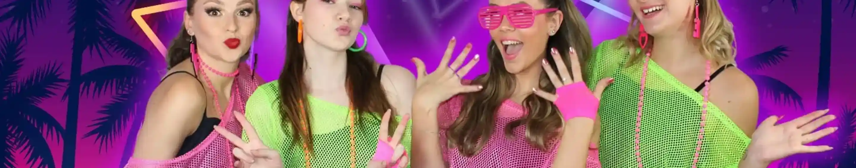 Four young women pose in bright, 80s-inspired outfits with neon mesh tops, colorful accessories, and fun hairstyles. They strike playful poses against a vibrant, retro-themed background featuring geometric shapes and stars.