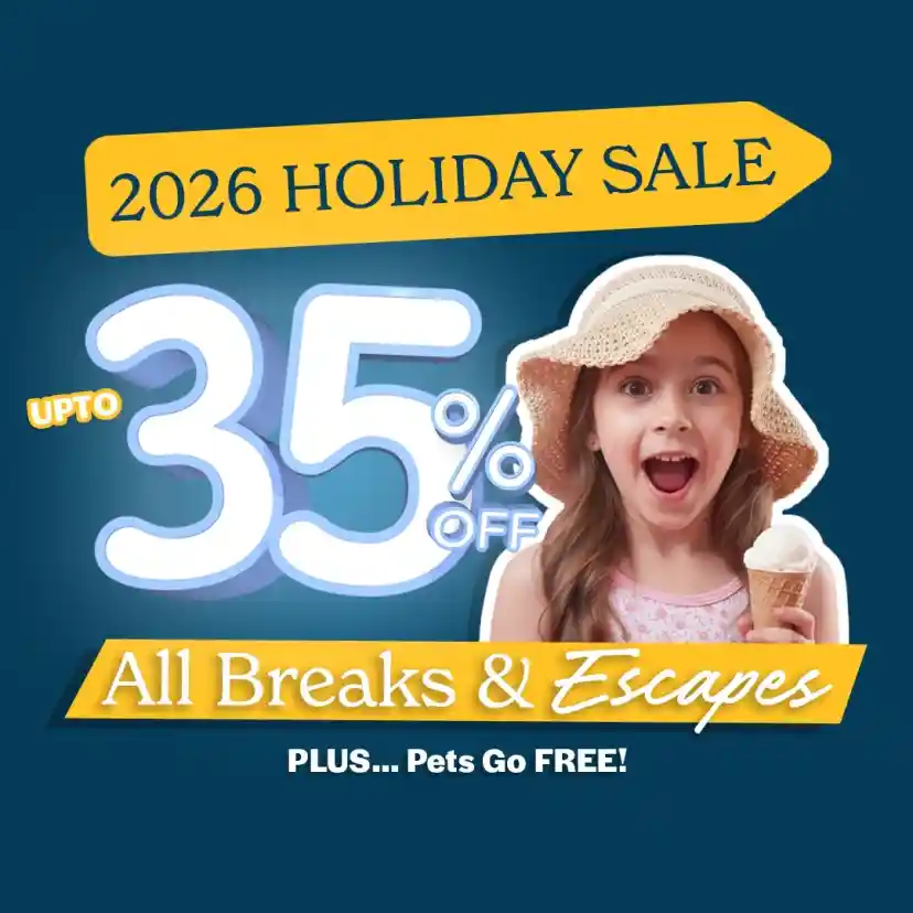 A young girl in a straw hat excitedly holds an ice cream cone, with promotional text highlighting a holiday sale offering up to 35% off on breaks and escapes, and mentioning that pets go free.
