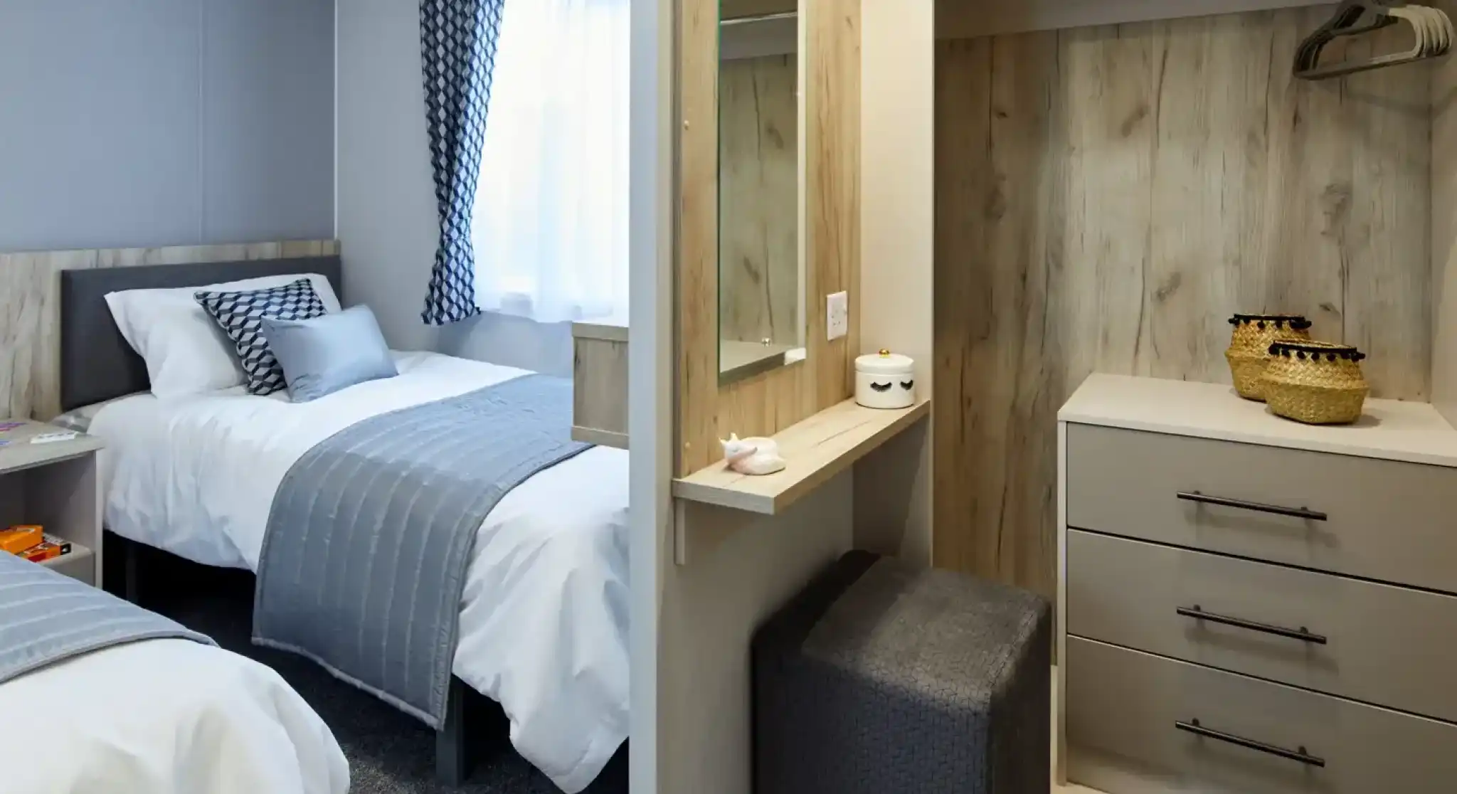 A bedroom with two beds, a closet with a vanity and stool, and a window with patterned curtains.