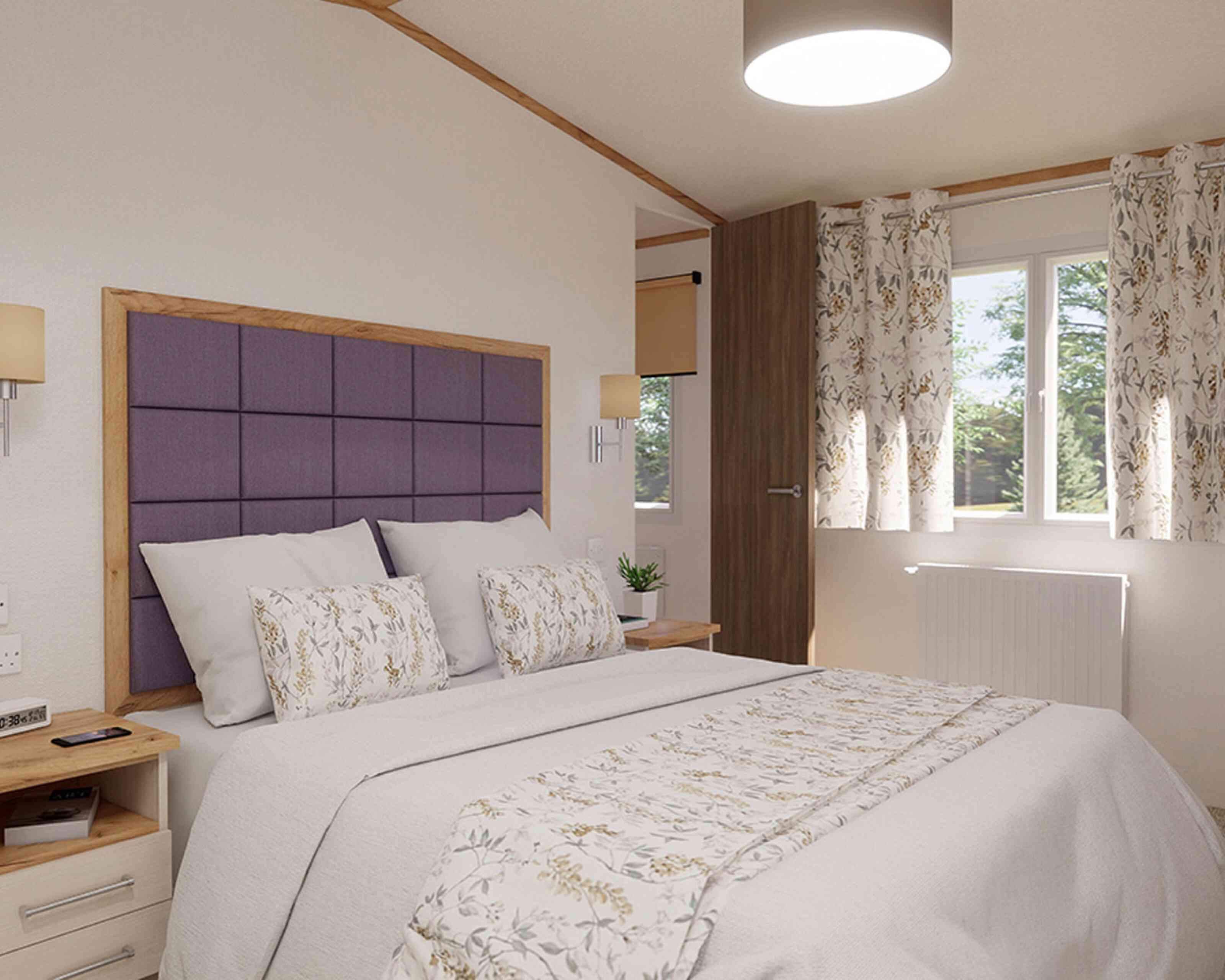 A stylish bedroom featuring a double bed, two bedside tables and a window, creating a warm and inviting atmosphere.