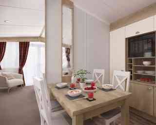 Contemporary dining area set for four with food and juice, adjacent to a comfortable living room with sofa and curtains.