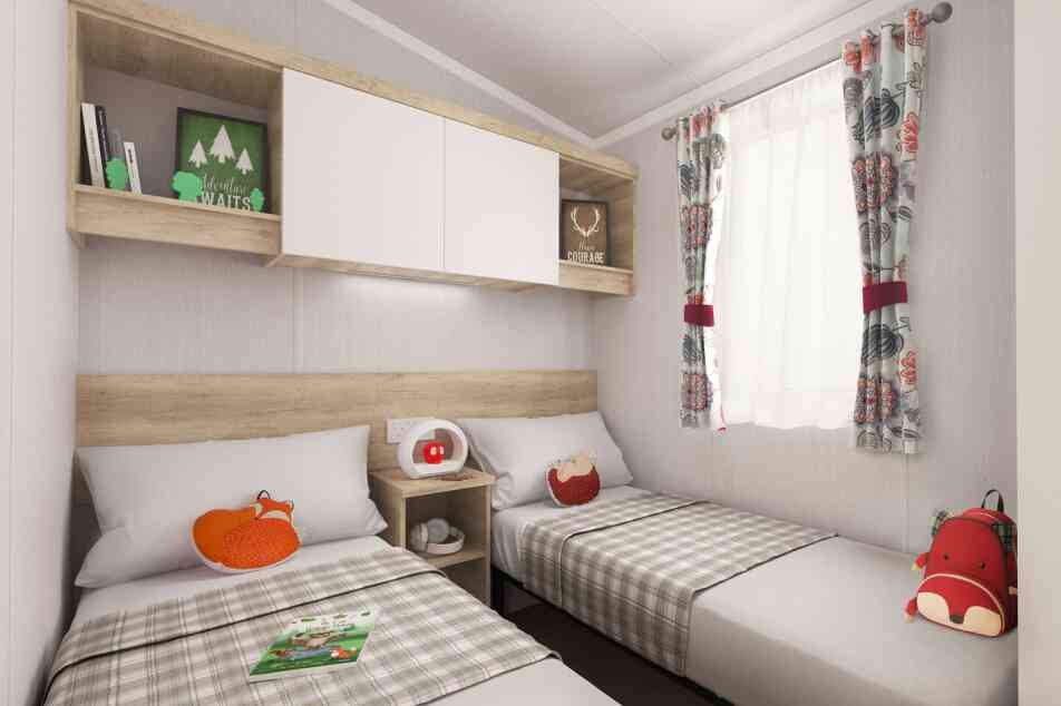 Warm twin bedroom with neutral walls, plaid-covered single beds, fox plushies, wooden shelves, and a sunny window with floral curtains.